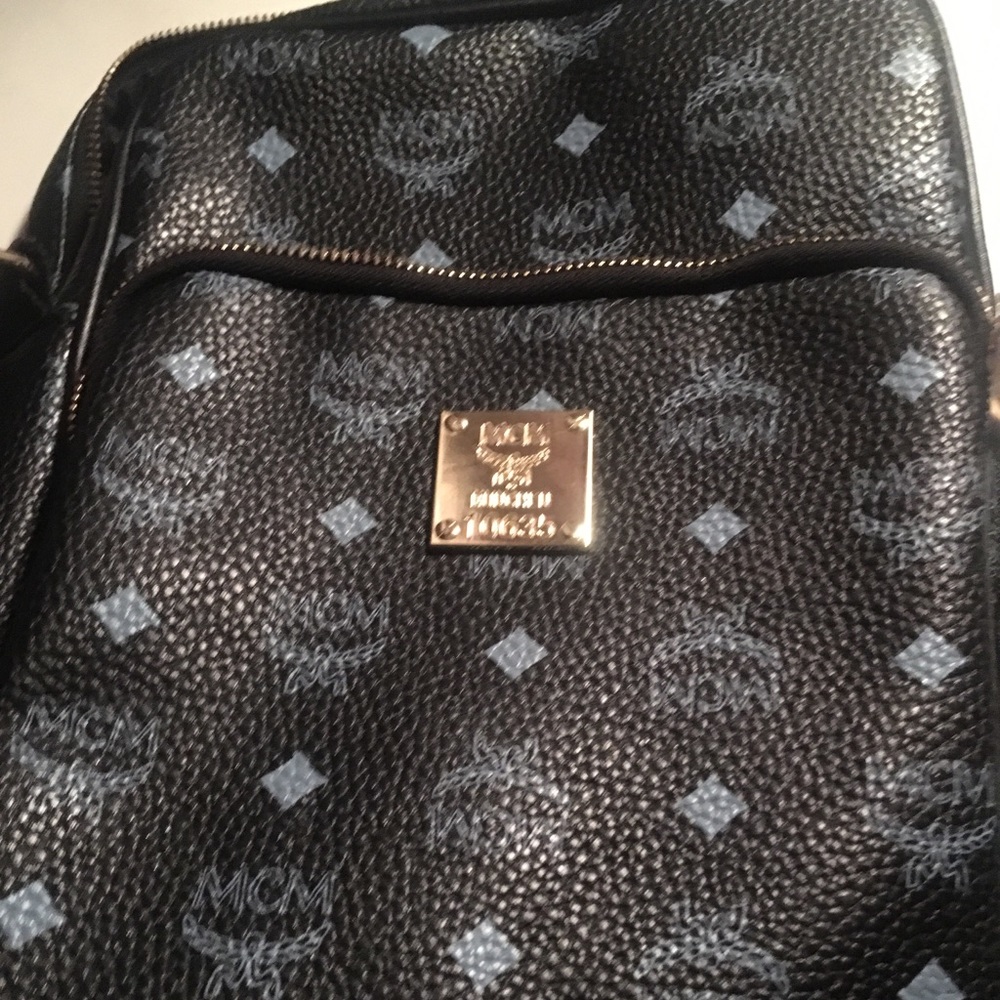 Side strap mcm bag
